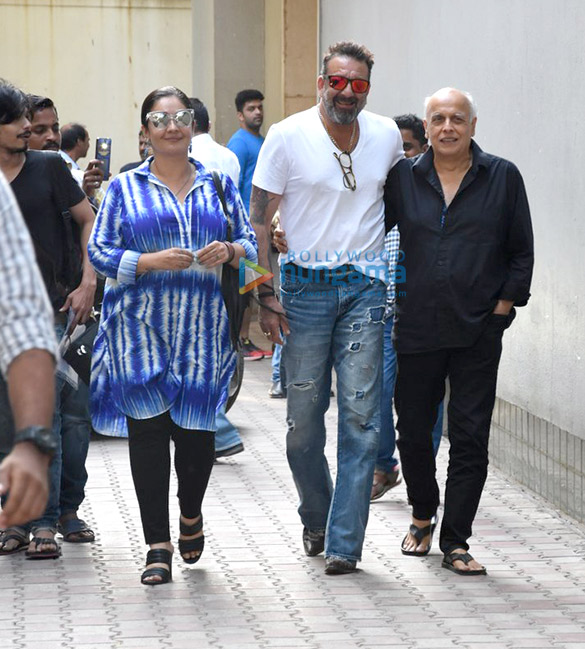 Sanjay Dutt snapped making a style statement with reflector shades with Mahesh Bhatt and Pooja Bhatt after a meeting at Vishesh Films’ office Sanjay Dutt, Mahesh Bhatt and Pooja Bhatt snapped post meeting at Vishesh Films' office
