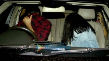 GUESS WHO? The granddaughter of a megastar was hiding her face when paparazzi spotted her with a friend