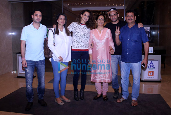 Kangana Ranaut snapped with her family post dinner in Bandra Kangana Ranaut & family snapped post dinner in Bandra