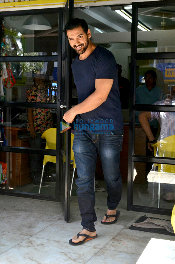 John Abraham snapped with his dog post visiting a Veterinary clinic in Bandra John Abraham snapped with his dog post visiting a Veterinary clinic in Bandra