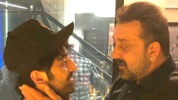 Ranbir Kapoor and Sanjay Dutt caught in a candid moment as they catch up ahead of Sanju release