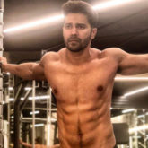 Raising the hotness quotient, Varun Dhawan’s SHIRTLESS look is all you need to make your rainy day better!