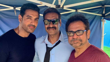 Anees Bazmee strikes a pose with his first hero and latest hero Ajay Devgn and John Abraham on the sets of Pagalpanti