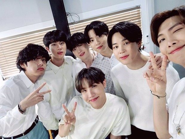 BTS poses for a group selfie and it's their first OT7 photo in a while