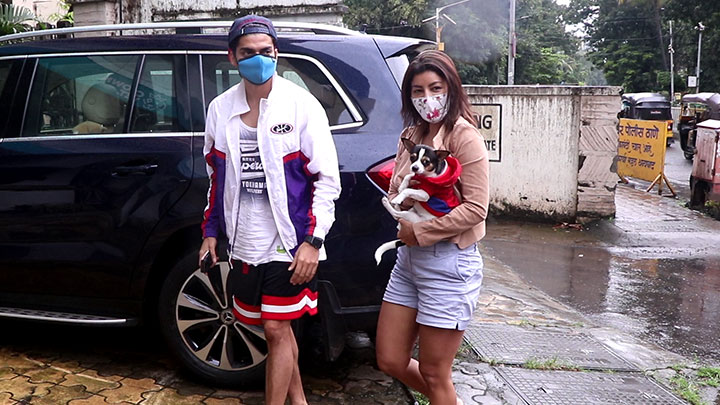 Gurmeet Choudhary and Debina Bonnerjee spotted with their pet dog in Bandra Gurmeet Choudhary and Debina Bonnerjee spotted with their pet dog in Bandra