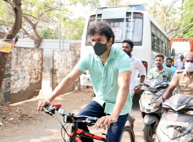 Vijay rides a bicycle to cast vote during Tamil Nadu ...