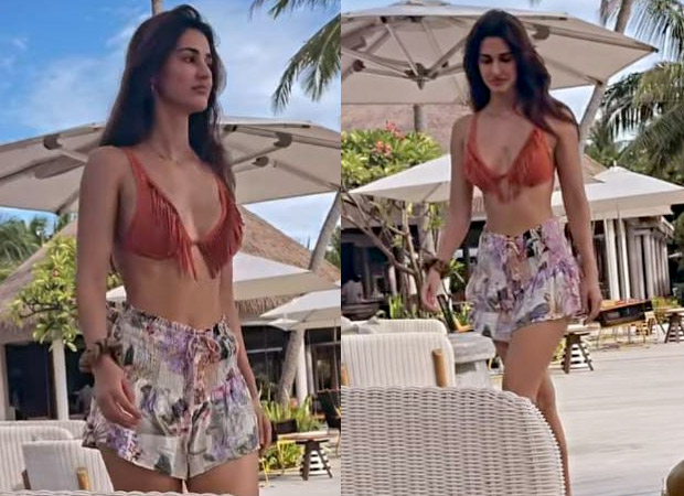 Disha Patani chills at a beach oozing hotness in bikini top and skirt