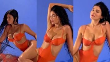 Kylie Jenner goes bold in sexy orange cut-out swimsuit from her latest collection