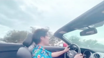 BTS’ V gives a glimpse of unreleased song while driving his convertible in Hawaii, watch video