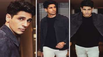 Sidharth Malhotra looks like a perfect gentleman in a dark grey jacket worth Rs. 23,600 and white jeans