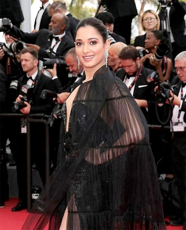 Cannes 2022: Tamannaah Bhatia seals it with a kiss in black glistening thigh-high slit gown with a cape at the premiere of Top Gun: Maverick 