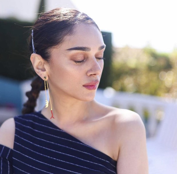 Aditi Rao Hydari is a style queen in stripe one shoulder top and asymmetrical skirt Cannes 2022