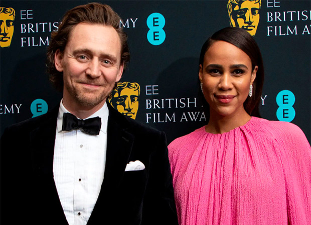 Tom Hiddleston and fiancée Zawe Ashton expecting their first child; actress debuts baby bump at Mr. Malcolm’s List premiere