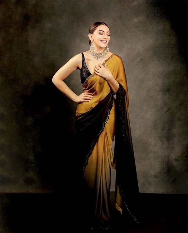 Hansika Motwani exudes royalty in stunning mustard black ombre saree worth Rs. 71,000 as she attends the audio launch of her film Maha