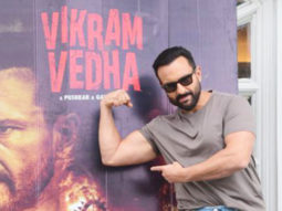 Saif Ali Khan poses with Vikram Vedha poster pre-release