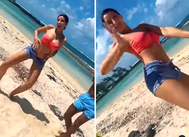Nora Fatehi oozes oomph in bikini top and denim shorts as she dances on 'Call Me Every Day' in Mauritius : Bollywood News - Vimarsana News